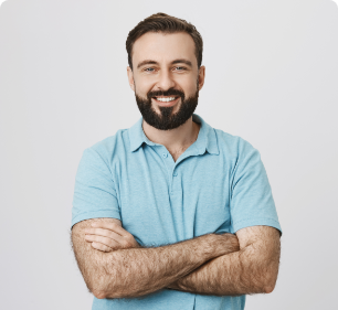 a man with beard and mustache wearing a blue shirt